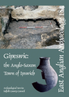 front cover with broken pottery beaker and excavated feature