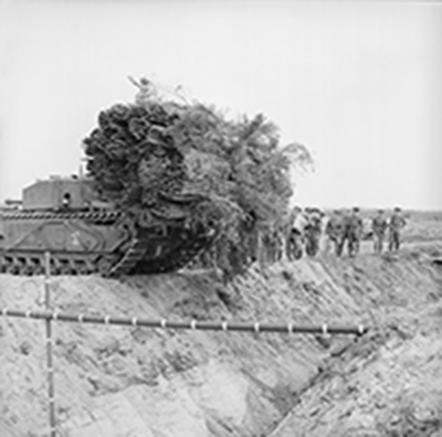 war photo of Fascine-carrying tank crossing an anti-tank ditches